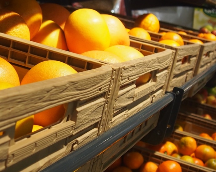 Orangen gelagert in Mehrwegtransportverpackungen